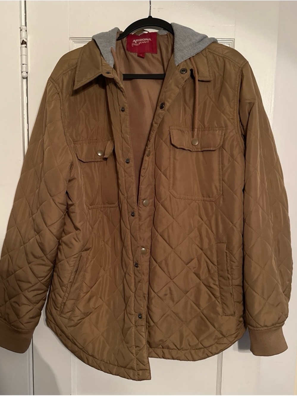 Tan lightweight quilted jacket with hood
